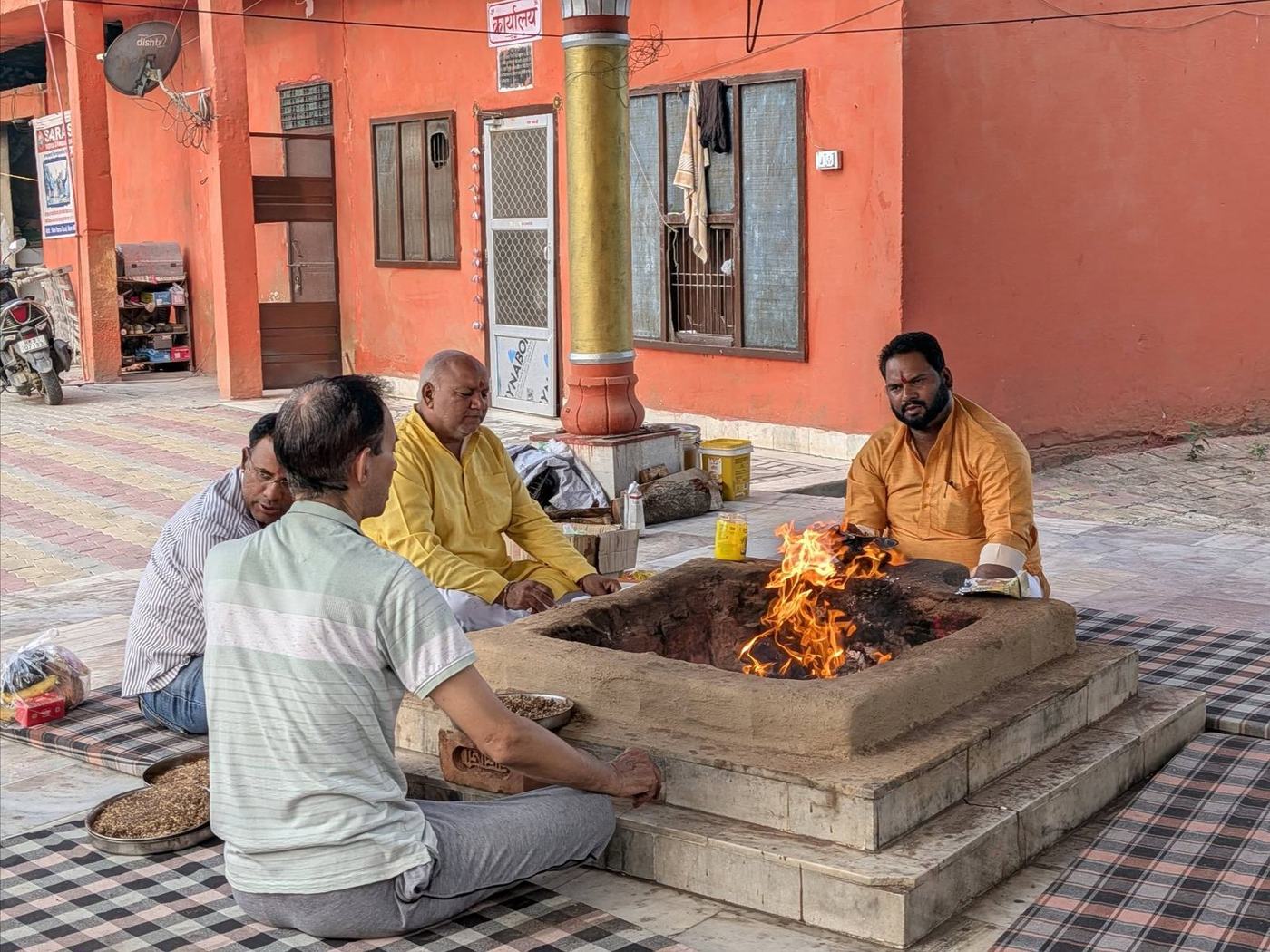 Priests and devotees at the havan kund
