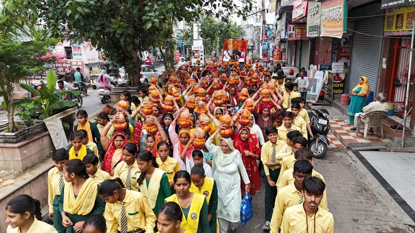 A procession of devotees through the streets of Jind