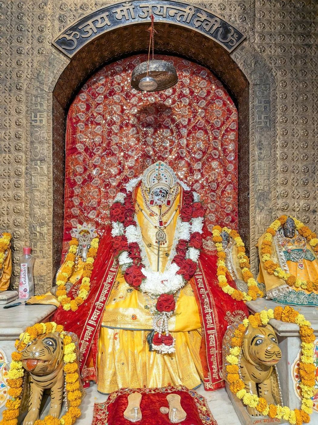Maa Jayanti Devi in the sanctum, flanked by lions